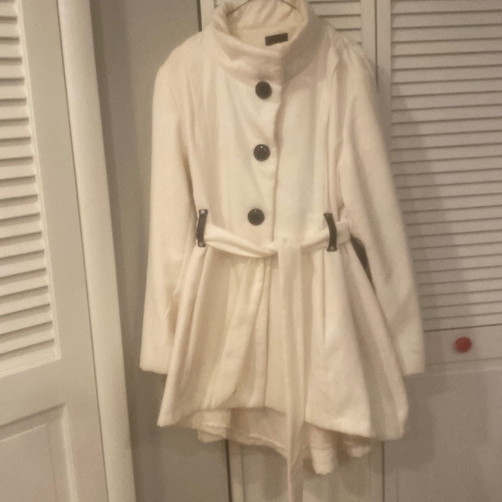 Woman’s white winter coat